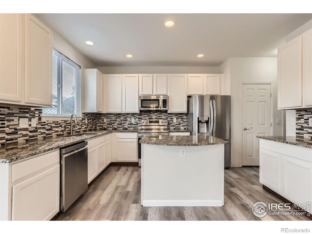 Photo of 4948 Spinning Wheel Drive, Brighton, CO 80601 (MLS # IR1042826)