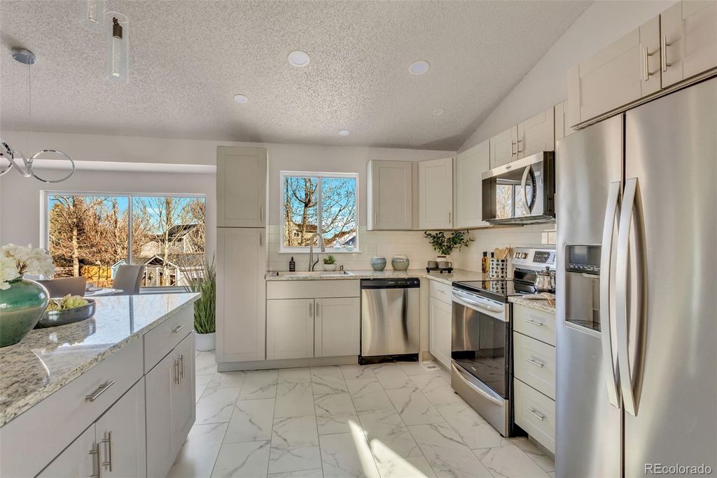 Photo of 5026 S Dunkirk Way, Centennial, CO 80015 (MLS # 4862887)