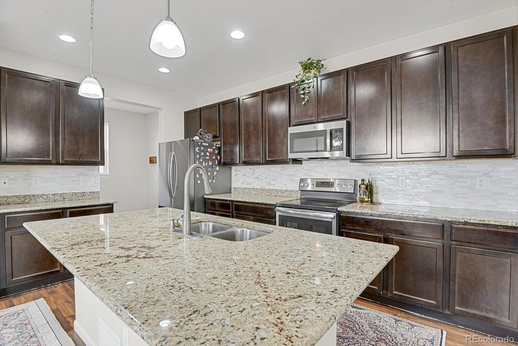 Photo of 19553 E 60th Place, Aurora, CO 80019 (MLS # 3754232)