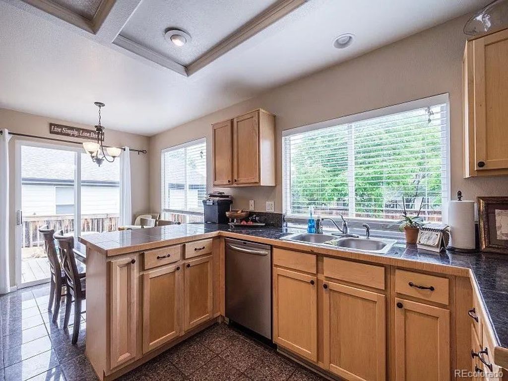 Photo of 7053 Leopard Drive, Littleton, CO 80124 (MLS # 7781275)