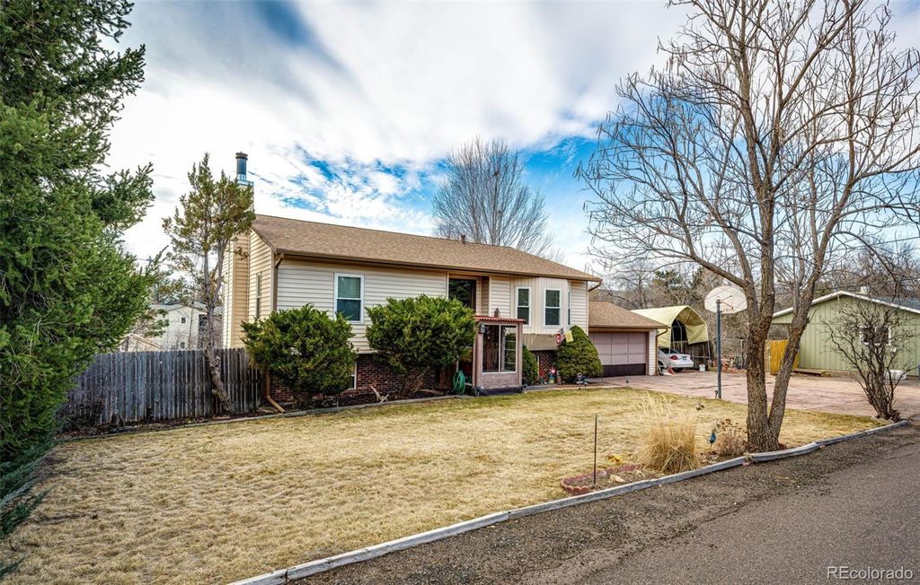 Photo of 7740 W Meadow Drive, Littleton, CO 80128 (MLS # 6568402)