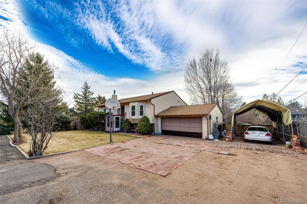 Photo of 7740 W Meadow Drive, Littleton, CO 80128 (MLS # 6568402)