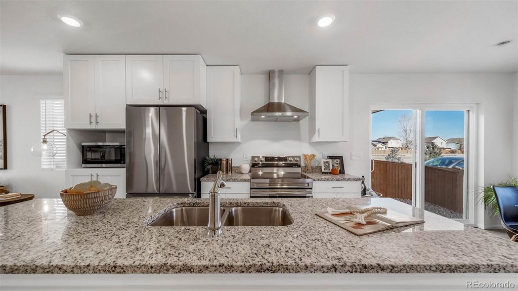 Photo of 12937 E 103rd Avenue, Commerce City, CO 80022 (MLS # 5825461)