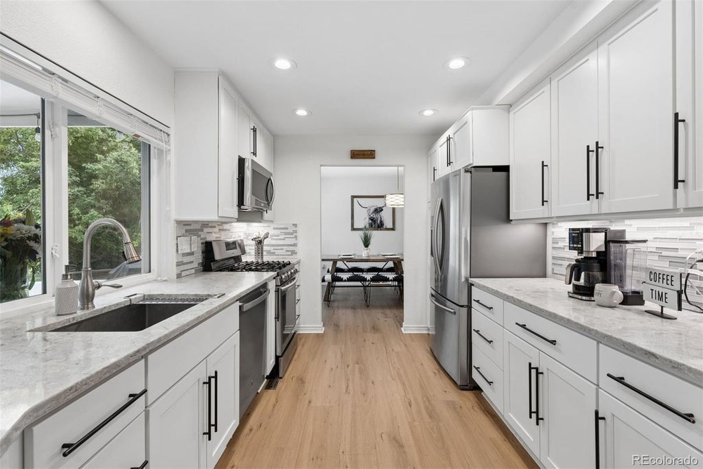 Photo of 7626 S Willow Way, Centennial, CO 80112 (MLS # 8189025)