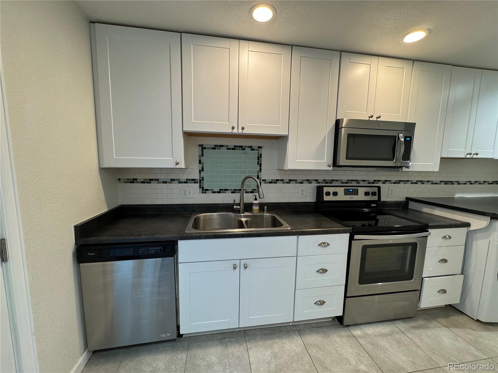 Photo 4 of 29 of 6373 Zang Court B townhome
