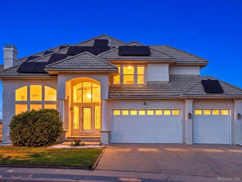 Photo of 7844 W Oxford Circle, Denver, CO 80235 (MLS # 4144576)