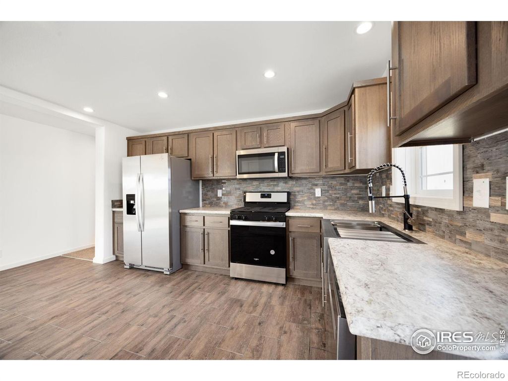 Photo of 533 Book Cliffs Drive, Loveland, CO 80537 (MLS # IR1045472)