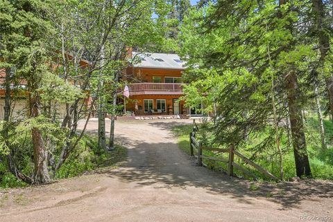 Photo of 11182 S Barney Gulch Road, Conifer, CO 80433 (MLS # 9836624)