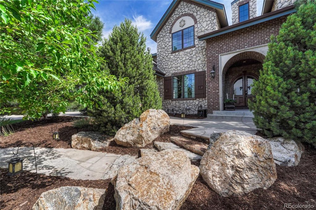 Photo of 1033 Buffalo Ridge Road, Castle Pines, CO 80108 (MLS # 5955208)