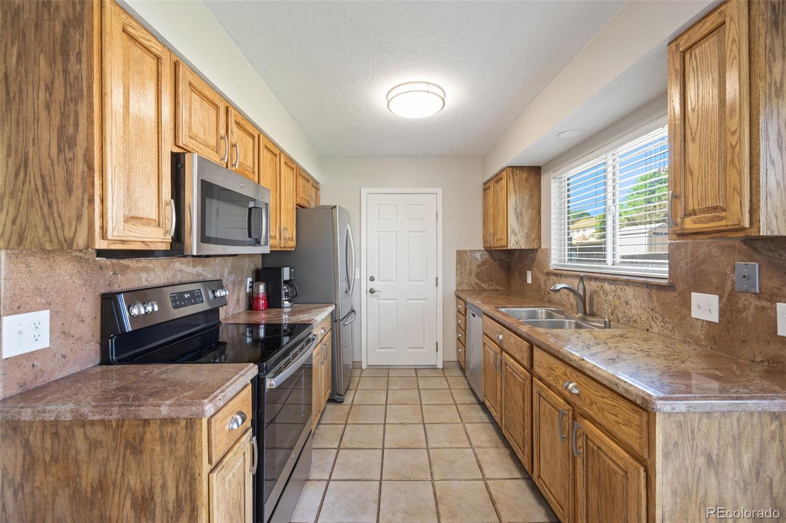 Photo 9 of 34 of 4807 S Xenophon Way house