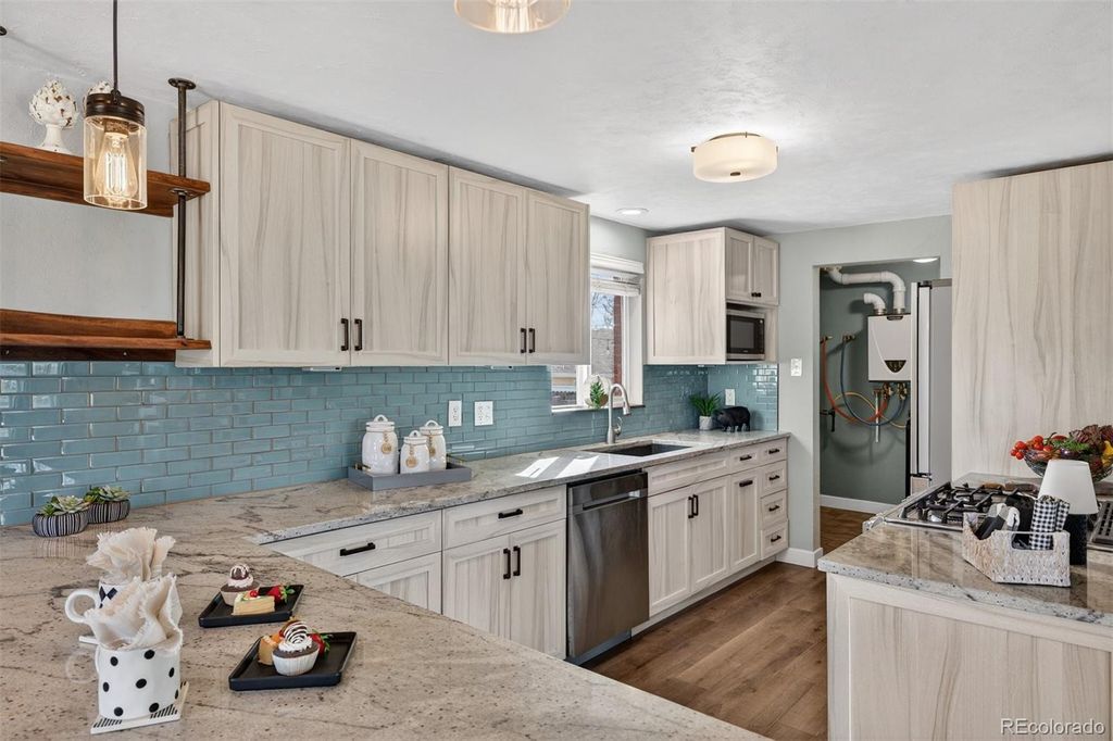 Photo of 7350 W 21st Avenue, Lakewood, CO 80214 (MLS # 5218364)