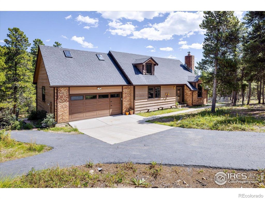 Photo of 10212 Dowdle Drive, Golden, CO 80403 (MLS # IR1041845)