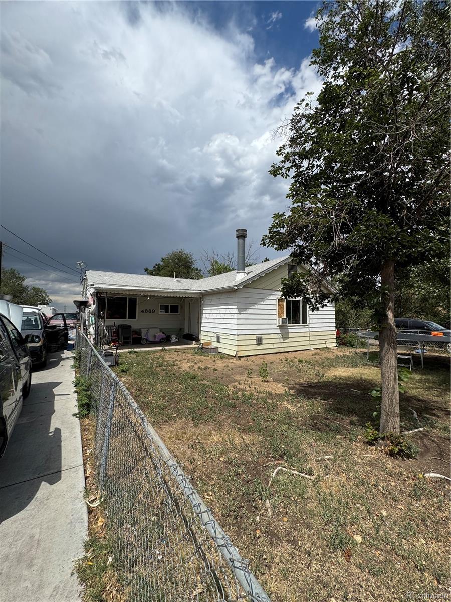 Photo of 4889 W Tennessee Avenue, Denver, CO 80219 (MLS # 8897346)