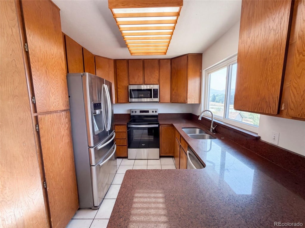 Photo of 8273 W Plymouth Place, Littleton, CO 80128 (MLS # 6100018)