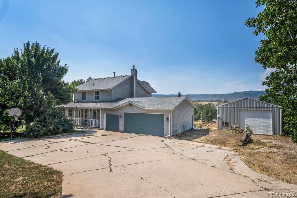 Photo of 7293 W Lakeside Drive, Littleton, CO 80125 (MLS # 4989101)