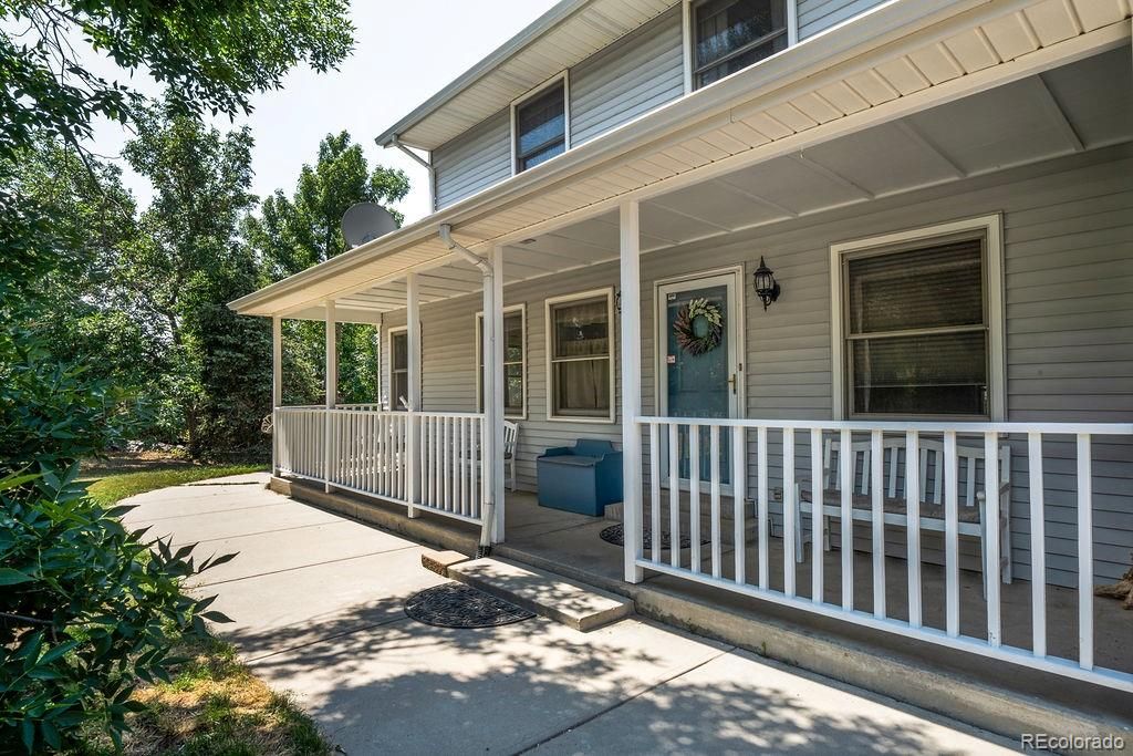 Photo of 7293 W Lakeside Drive, Littleton, CO 80125 (MLS # 4989101)