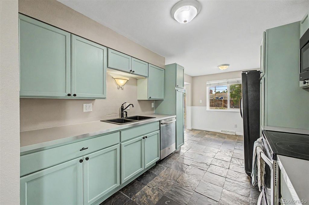 Photo of 5205 W 86th Avenue, Arvada, CO 80003 (MLS # 6037836)