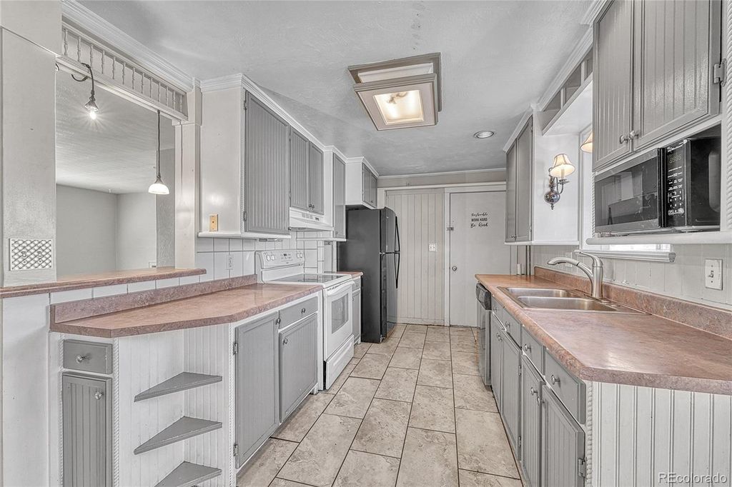 Photo of 8450 Turnpike Drive, Westminster, CO 80031 (MLS # 3377239)