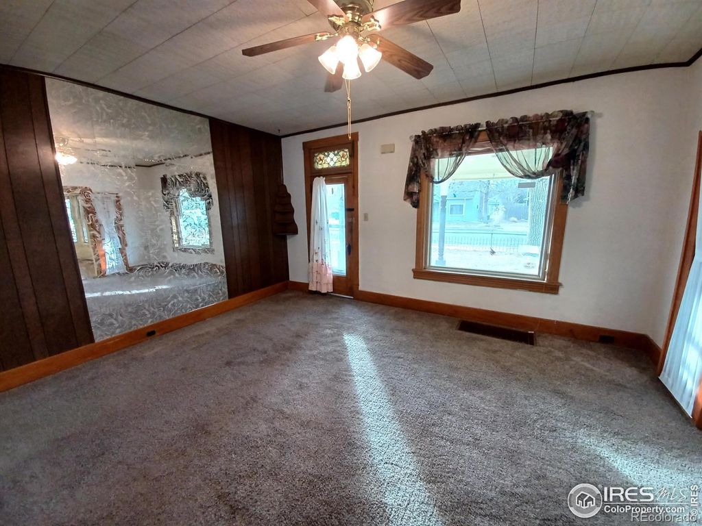 Photo of 409 E Cleveland Street, Lafayette, CO 80026 (MLS # IR1051429)