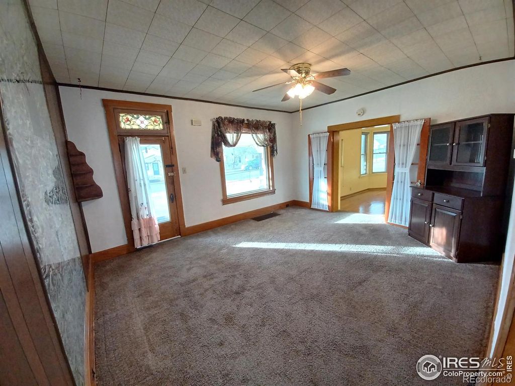 Photo of 409 E Cleveland Street, Lafayette, CO 80026 (MLS # IR1051429)
