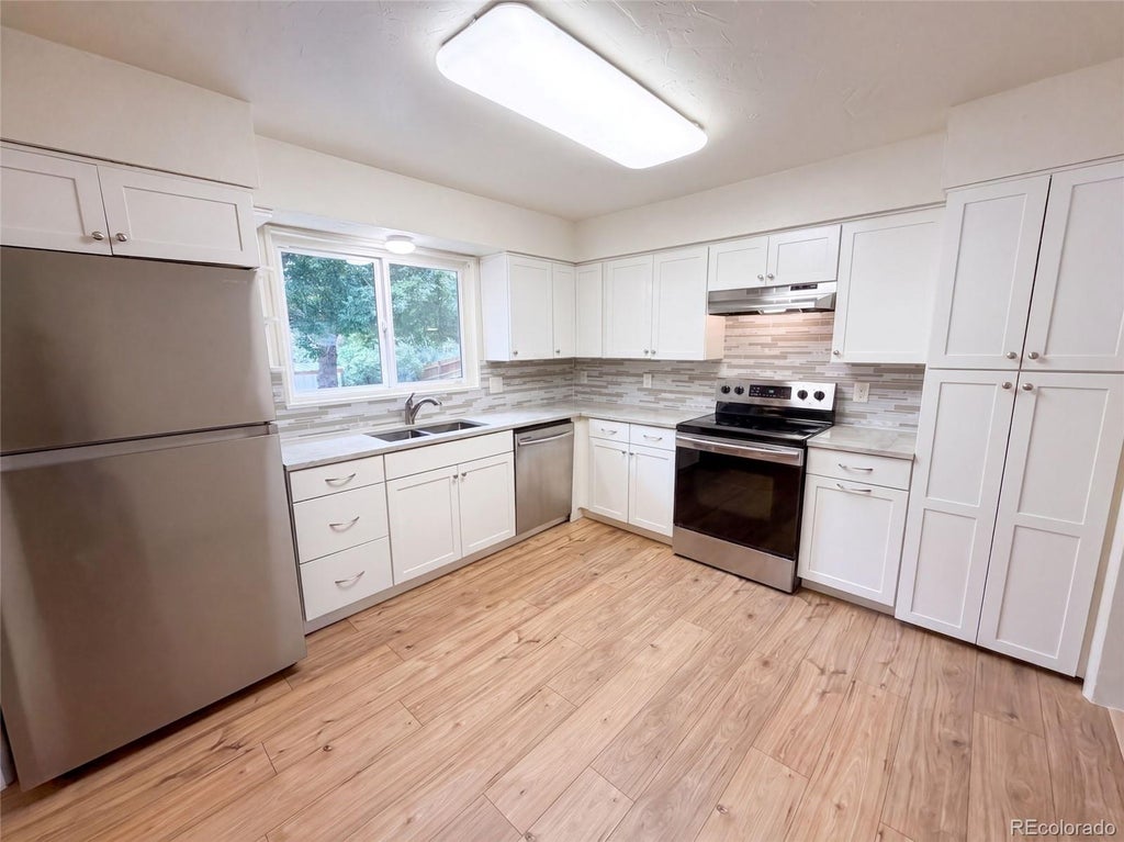 Photo of 3352 W Aksarben Avenue, Littleton, CO 80123 (MLS # 9324175)