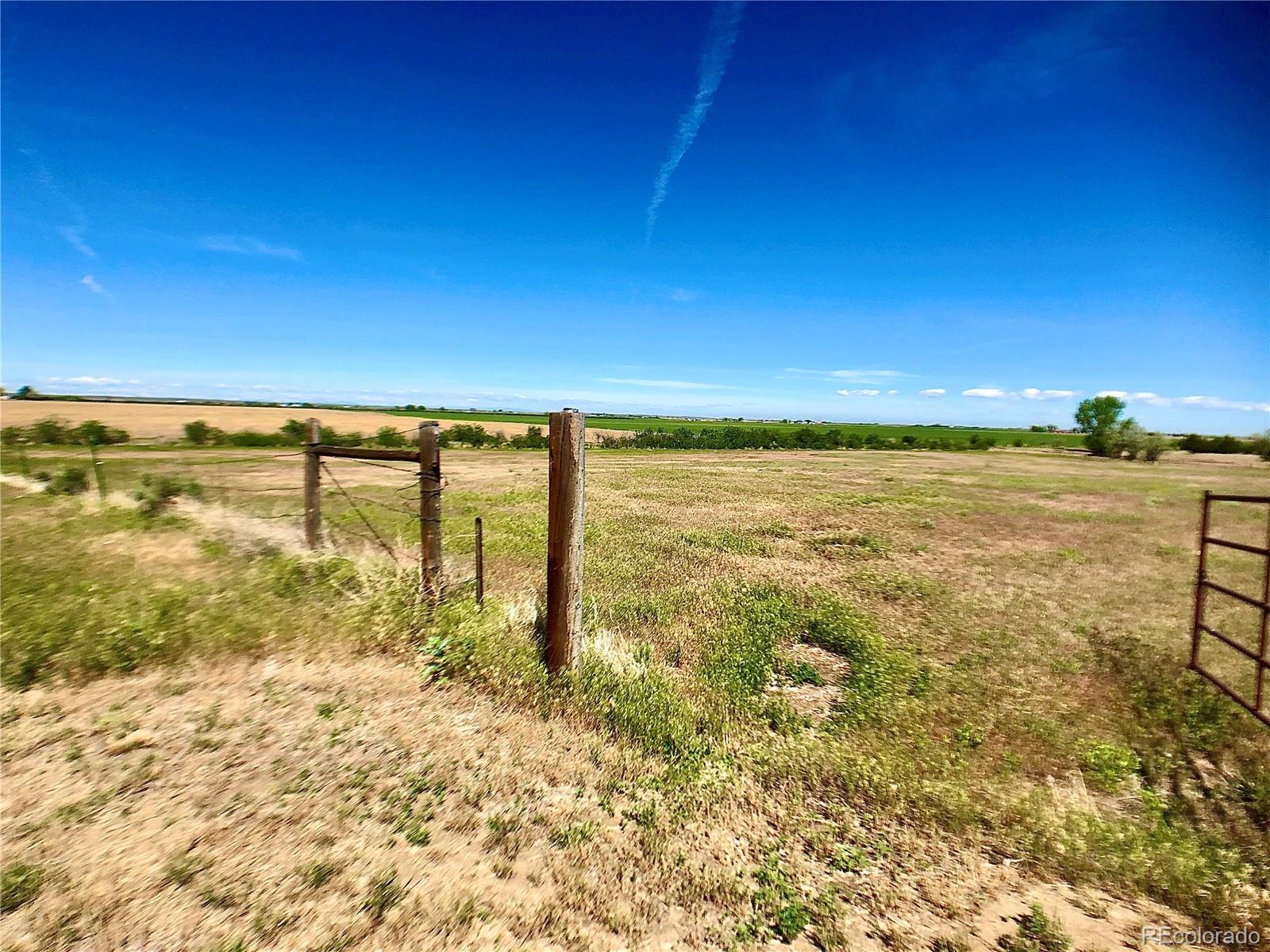 Photo 1 of 14 — County Road J, Wiggins, CO 80654