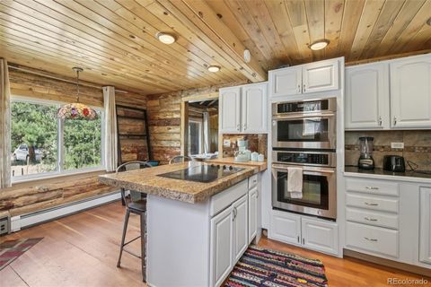 Photo of 33436 Coal Creek Canyon Road, Golden, CO 80403 (MLS # 5837220)