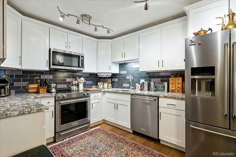 Photo of 9625 E Center Avenue #7B, Denver, CO 80247 (MLS # 8057836)