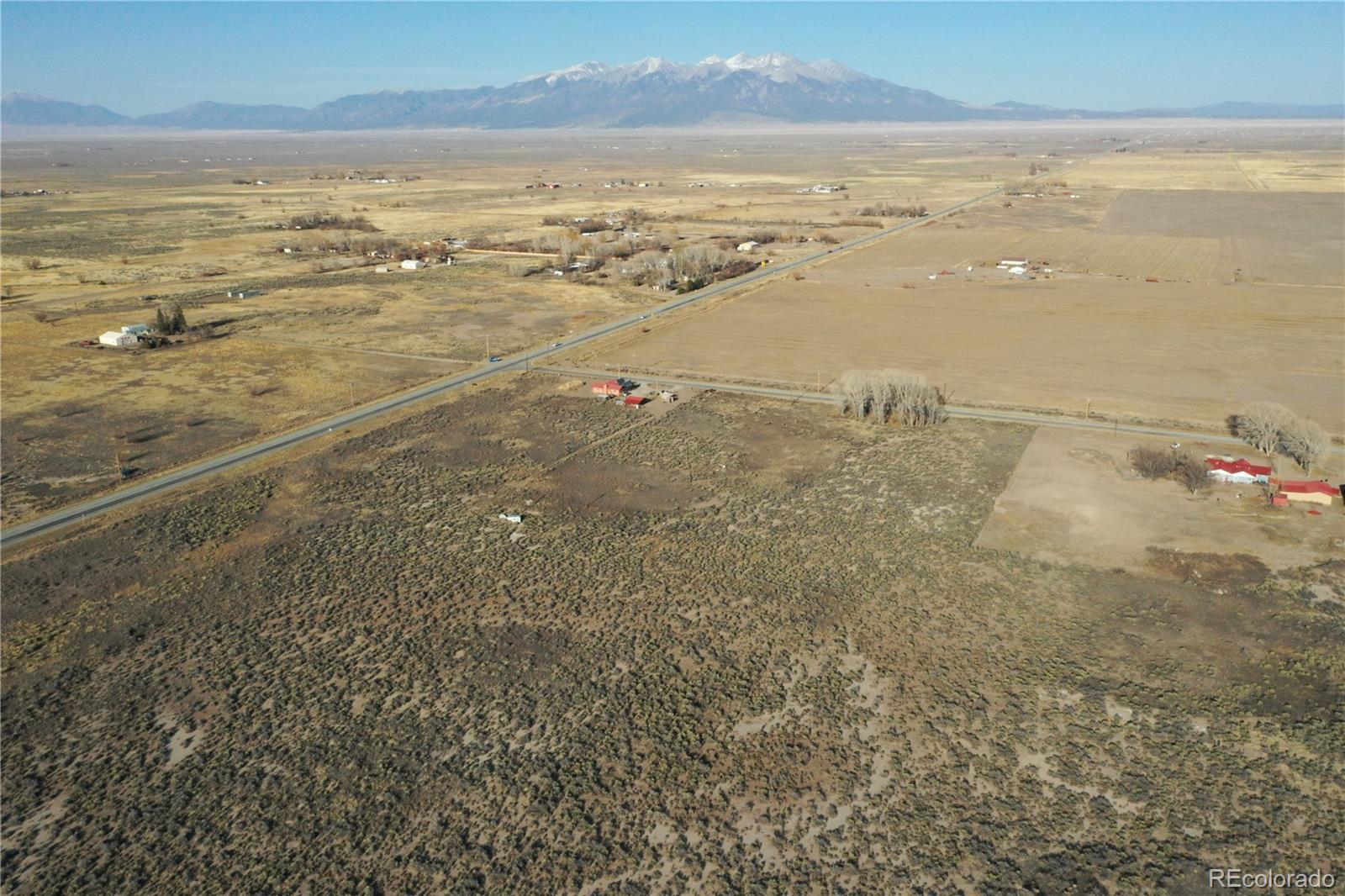 Highway 160 looking northeast to Mt Blanca and The Great National Sand Dunes.