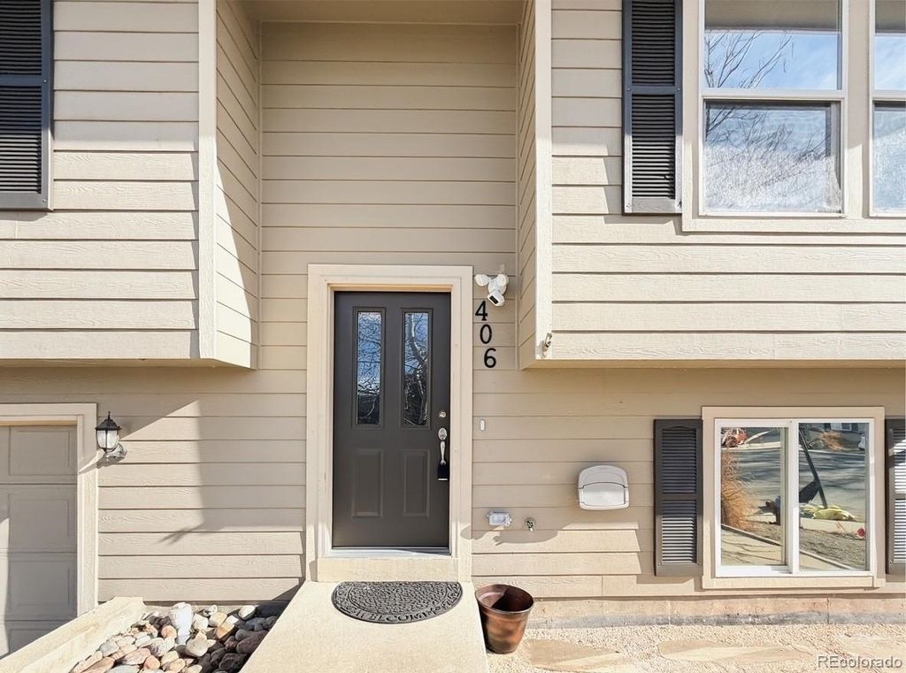 Photo of 406 Sundance Circle, Dacono, CO 80514 (MLS # 9892907)