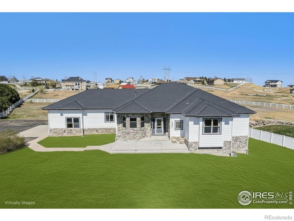 Photo of 10071 E 142nd Avenue, Brighton, CO 80602 (MLS # IR1049462)