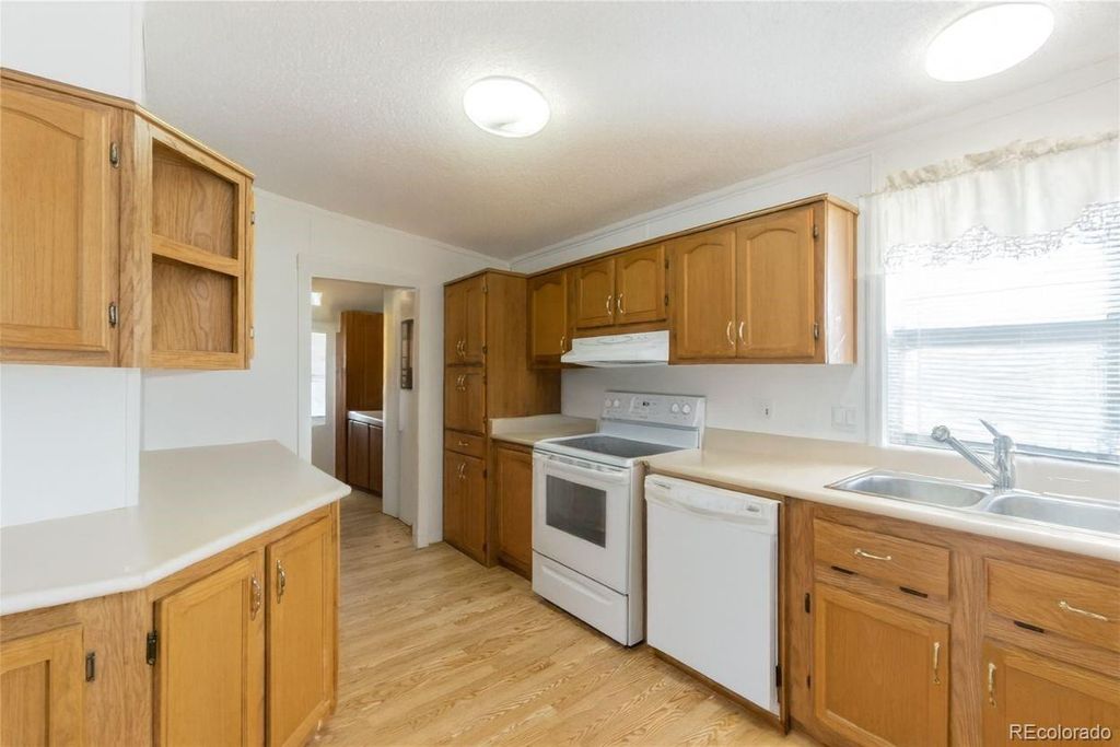 Photo of 9024 Madeleine Street, Denver, CO 80260 (MLS # 9832029)