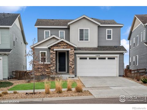 Photo of 15076 W 93rd Avenue, Arvada, CO 80007 (MLS # IR1047086)