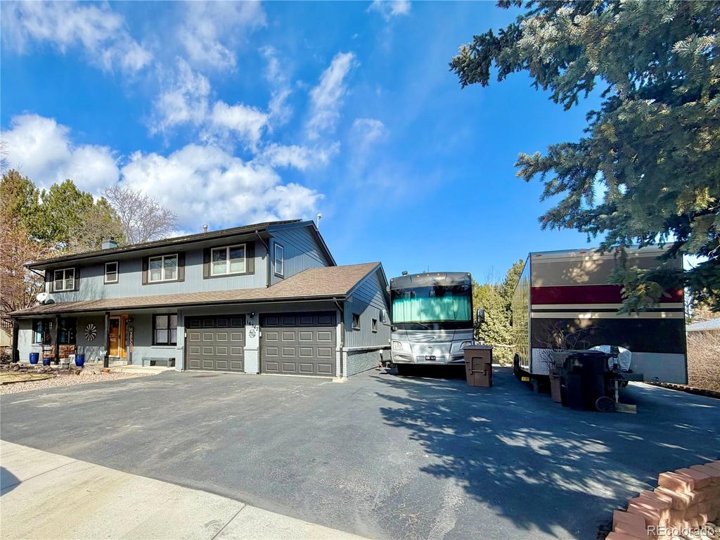 Photo of 16547 W 73rd Drive, Arvada, CO 80007 (MLS # 7479824)