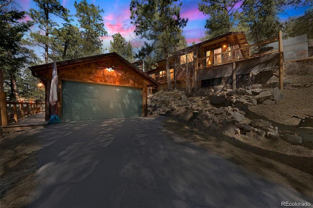 Photo of 27407 Upper Cold Spg Gulch Road, Golden, CO 80401 (MLS # 1860646)