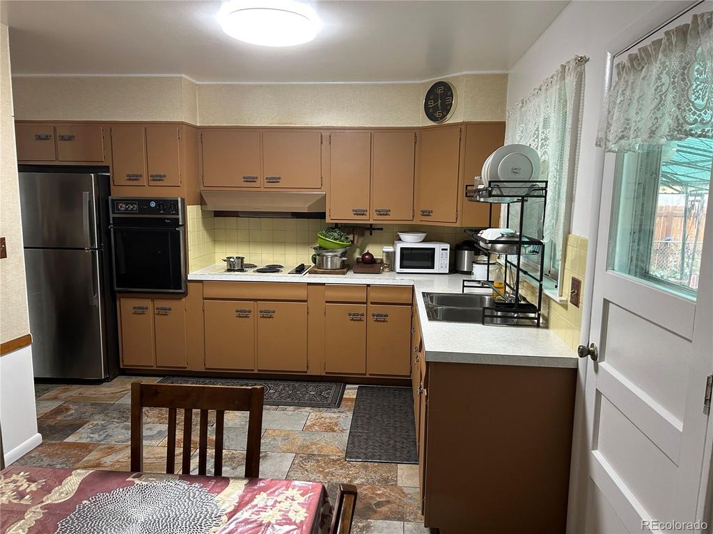 Photo of 3329 W Monmouth Avenue, Englewood, CO 80110 (MLS # 7913423)