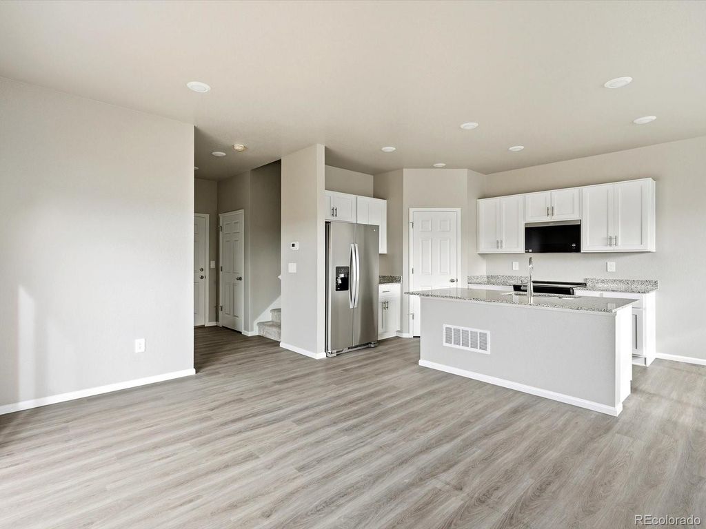 Photo of 2233 E 164th Avenue, Thornton, CO 80602 (MLS # 2330610)