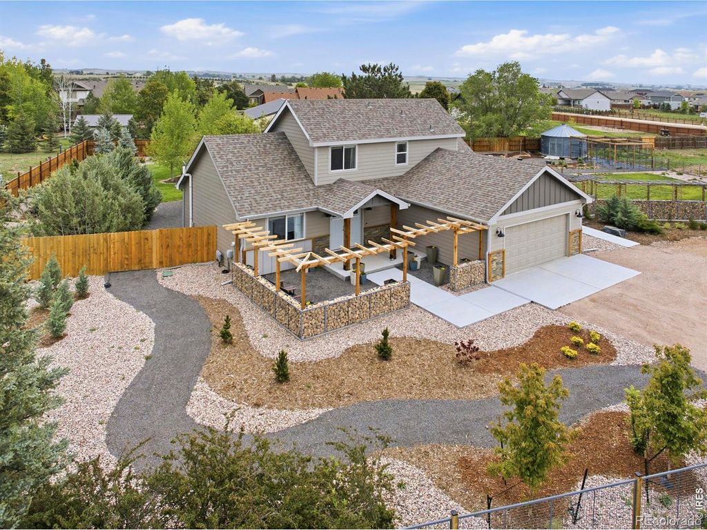 Photo of 7702 Fox Chase Lane, Wellington, CO 80549 (MLS # IR1059941)