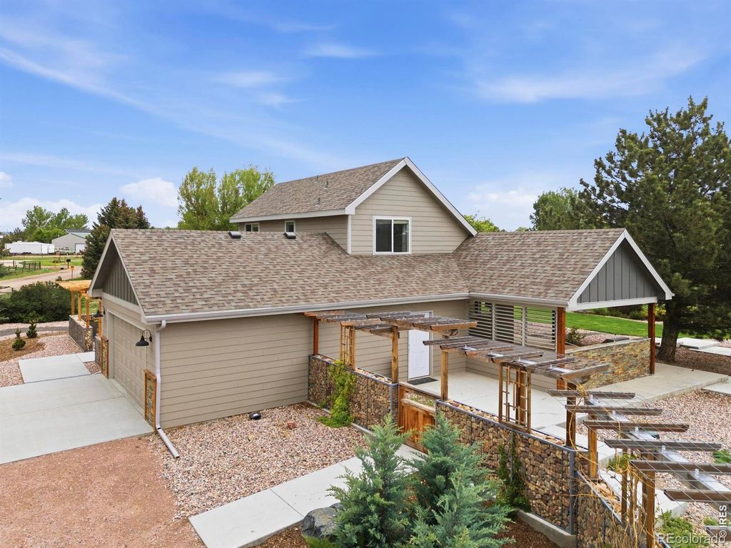 Photo of 7702 Fox Chase Lane, Wellington, CO 80549 (MLS # IR1059941)