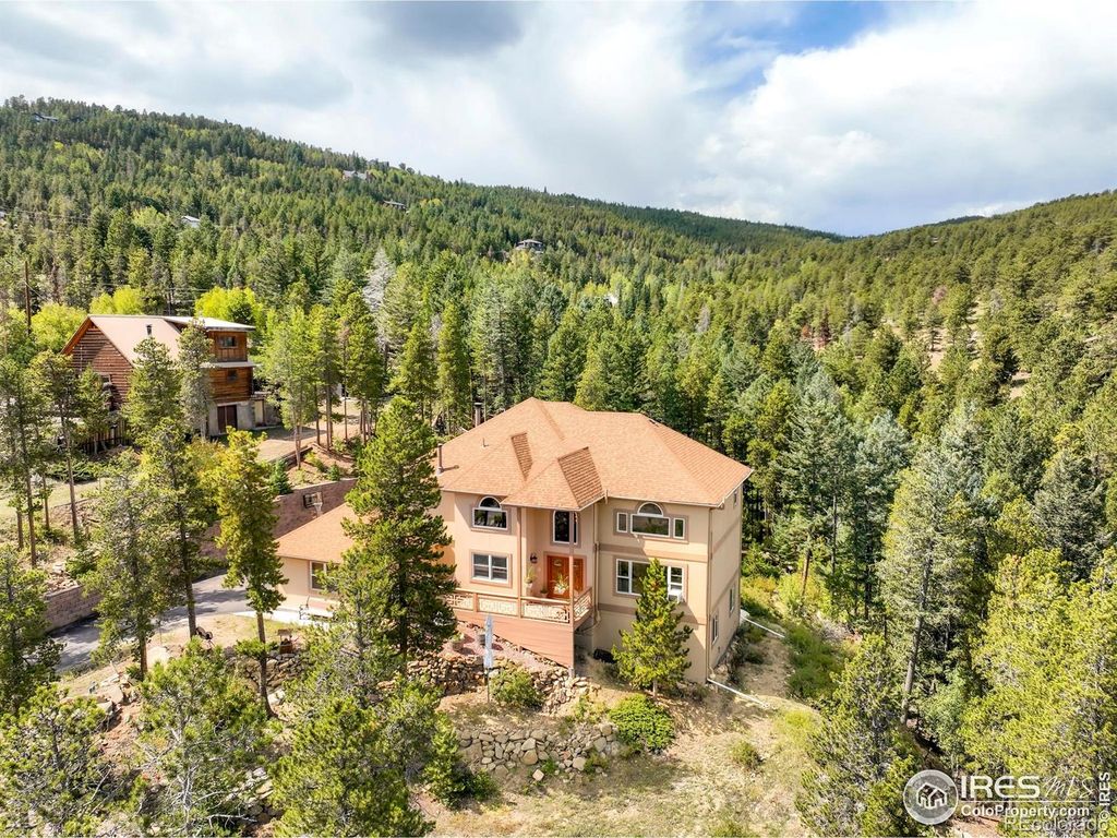 Photo of 12023 Coal Creek Heights Drive, Golden, CO 80403 (MLS # IR1041751)