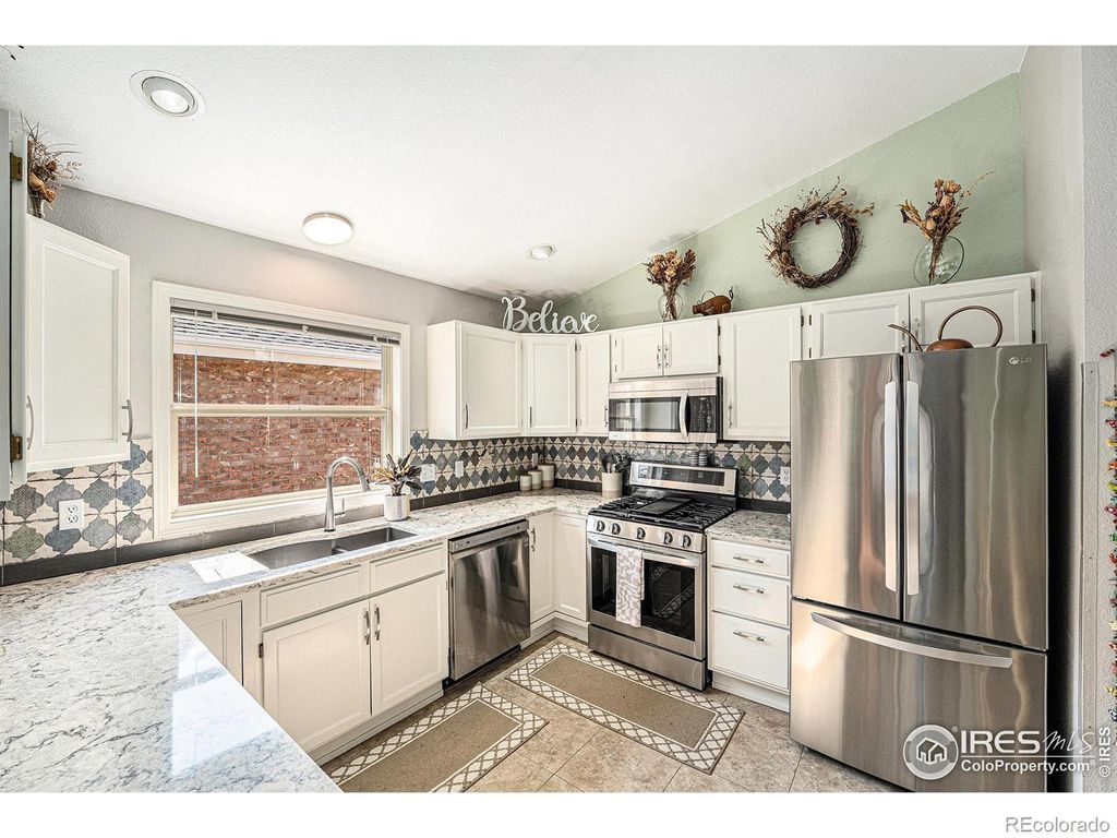 Photo of 712 Wade Road, Longmont, CO 80503 (MLS # IR1043175)