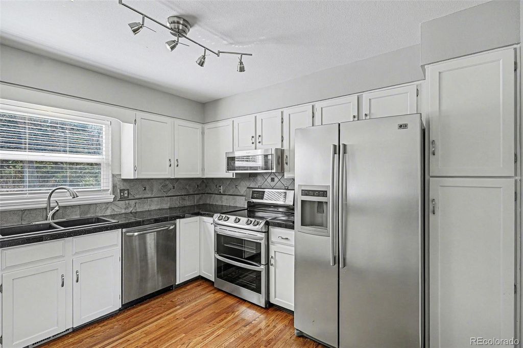 Photo of 5494 E Hinsdale Circle, Centennial, CO 80122 (MLS # 8509699)