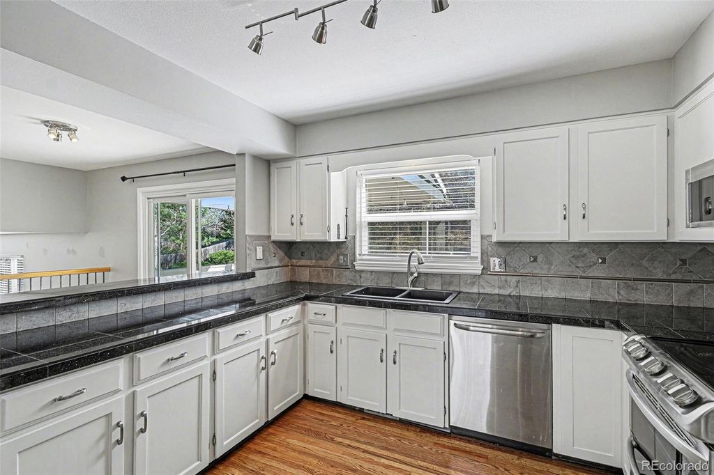 Photo of 5494 E Hinsdale Circle, Centennial, CO 80122 (MLS # 8509699)