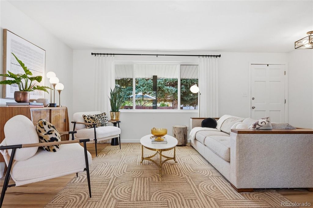 Photo of 7790 S Harlan Way, Littleton, CO 80128 (MLS # 3864539)