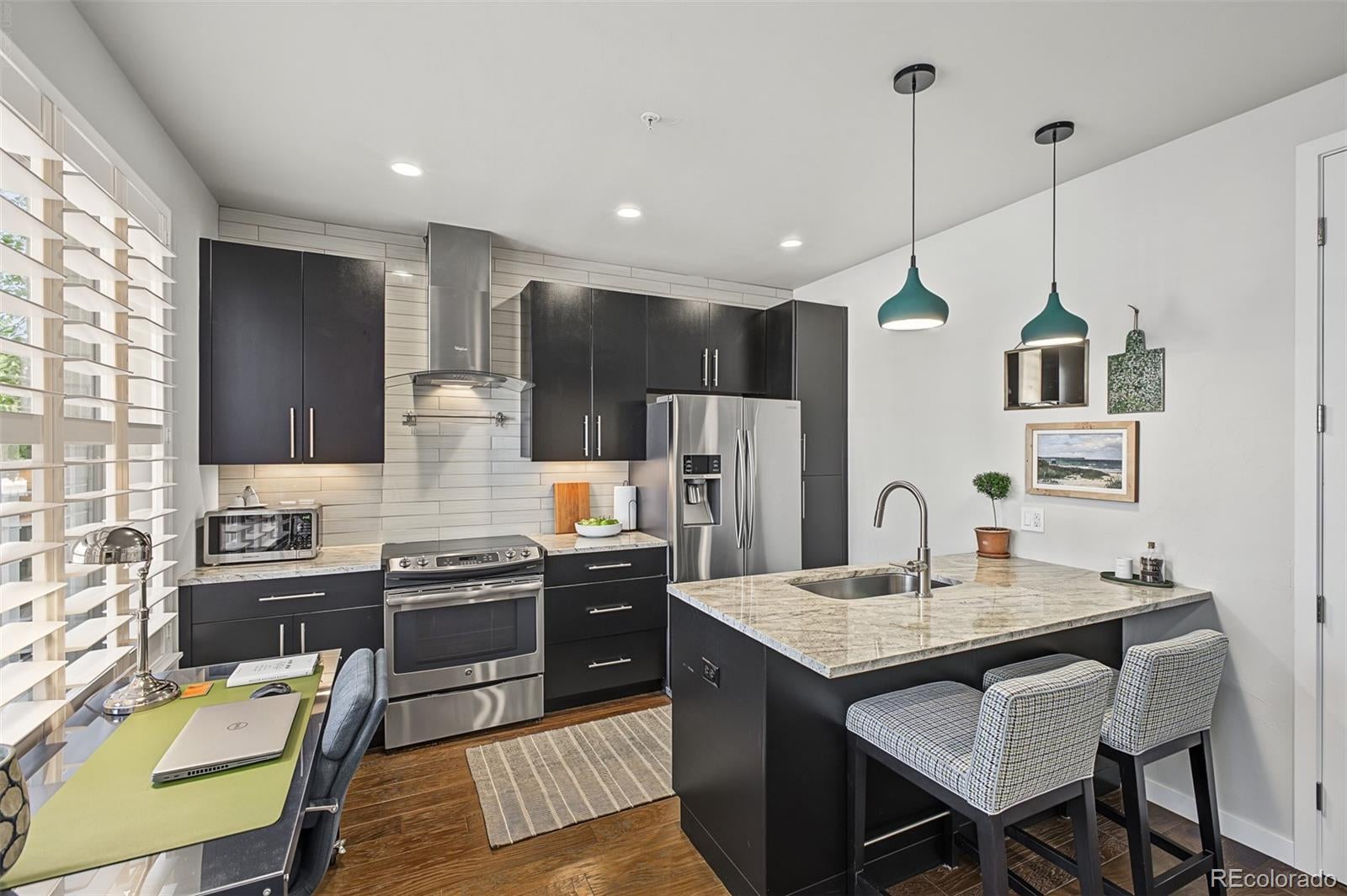 336 E 1st Avenue 100
