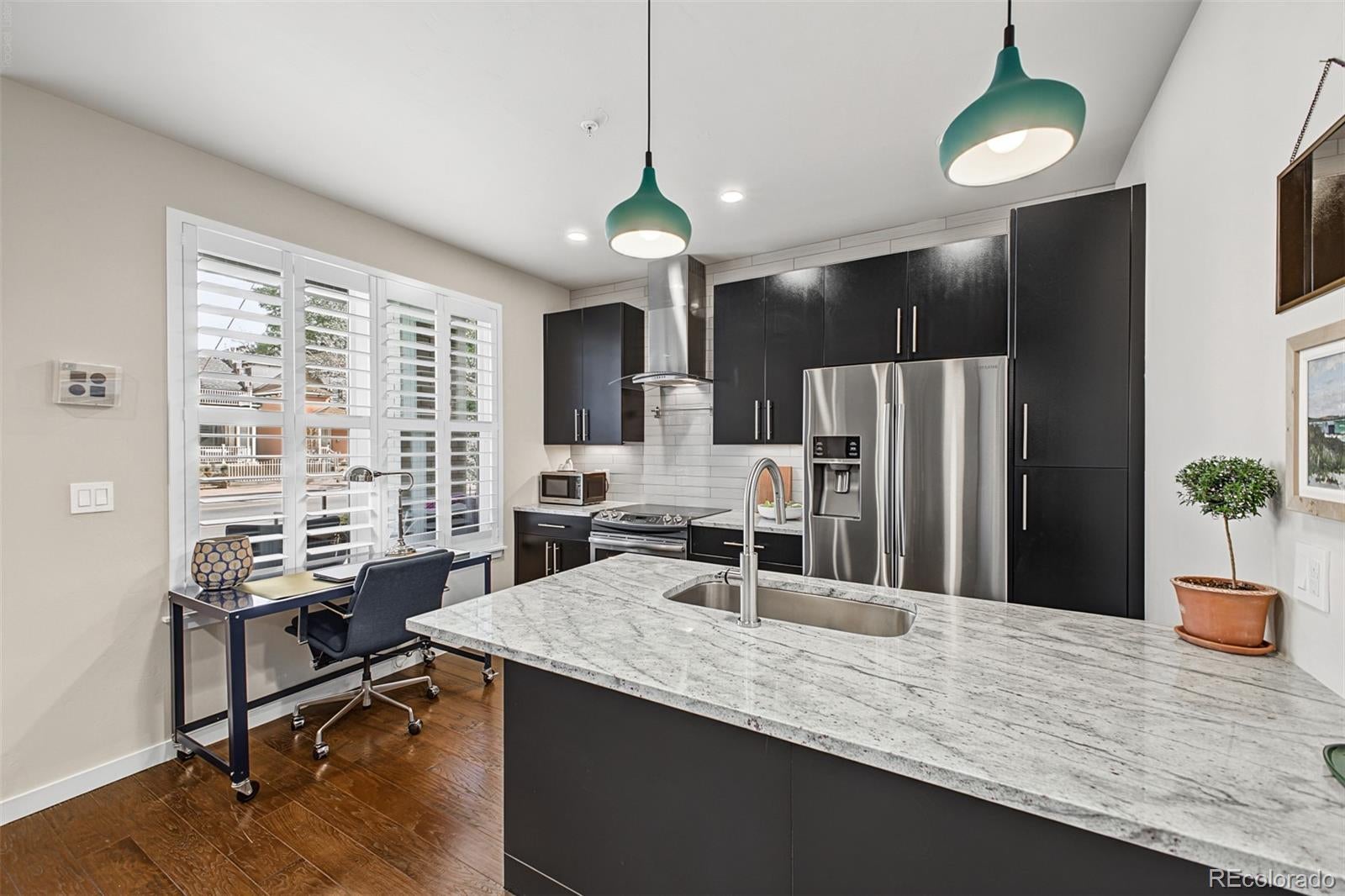 336 E 1st Avenue 100