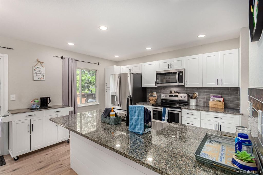 Photo of 21550 E Alamo Place, Centennial, CO 80015 (MLS # 7457060)