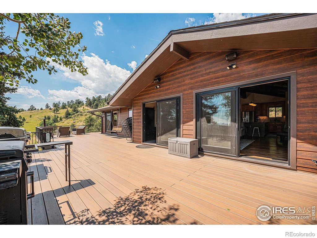 Photo of 27033 Thea Gulch Road, Golden, CO 80403 (MLS # IR1041238)