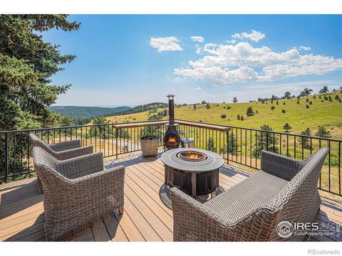 Photo of 27033 Thea Gulch Road, Golden, CO 80403 (MLS # IR1041238)