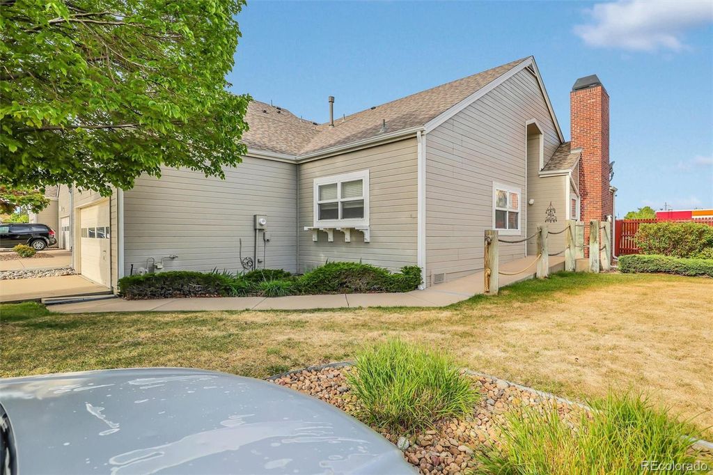 Photo of 15555 E 40th Avenue #7, Denver, CO 80239 (MLS # 6358038)